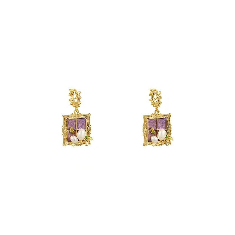 Orecchini barocchi perle viola