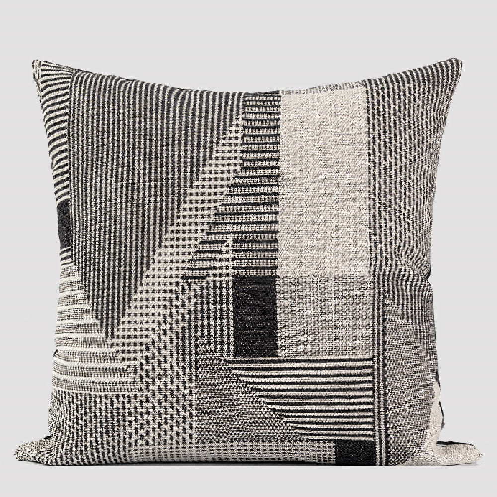 Cuscino grigio-nero astratto