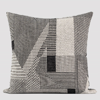 Cuscino grigio-nero astratto