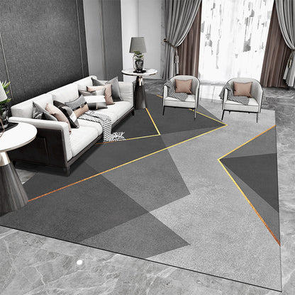 Tappeto geometrico grigio e nero con