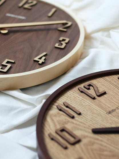 Orologio da parete Figure umane dorate