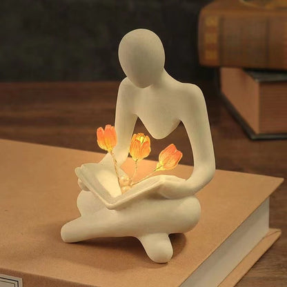 Scultura Lettore Luminosa