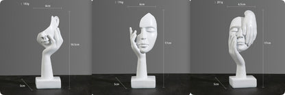 Sculture volti dorate emozioni tre