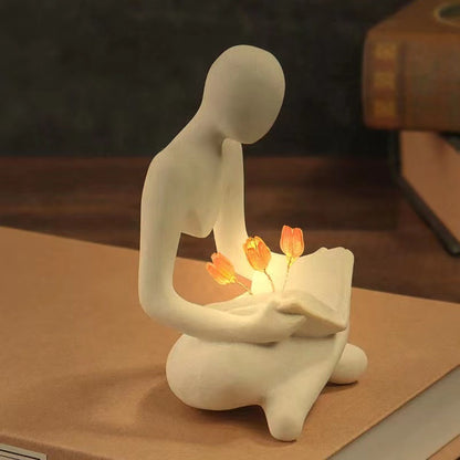 Scultura Lettore Luminosa