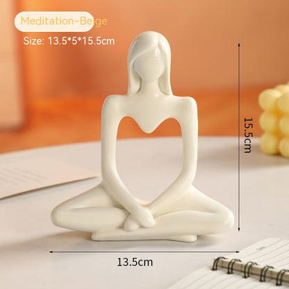 Figura femminile seduta porcellana bianca