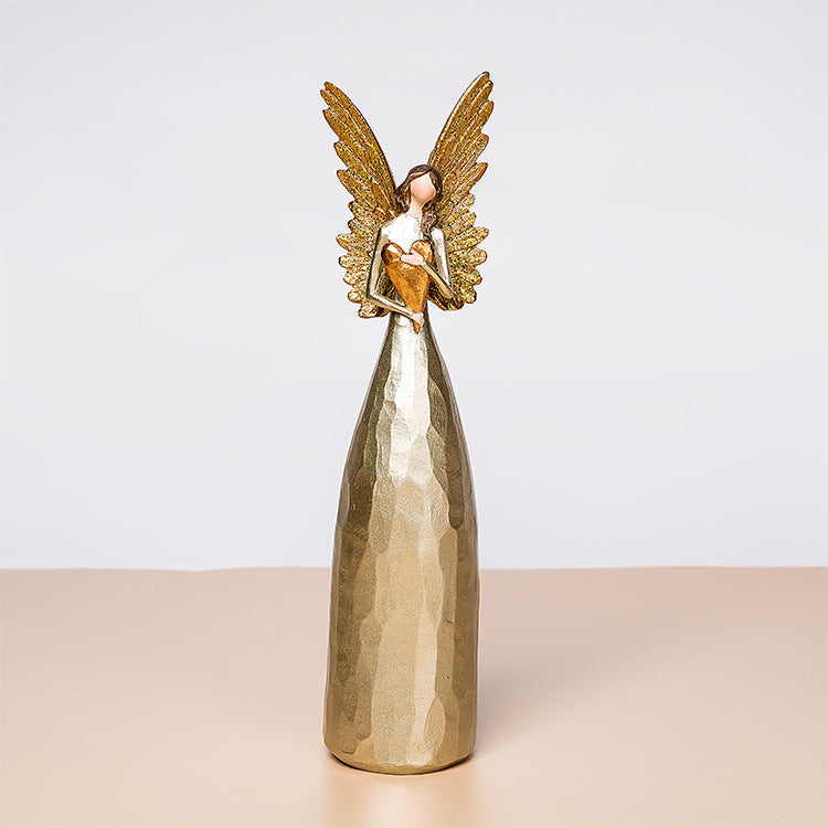 Quattro angeli snelli decorati oro