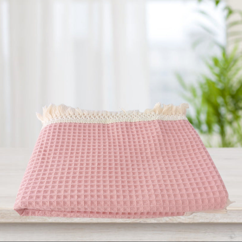 Coperta con nappine