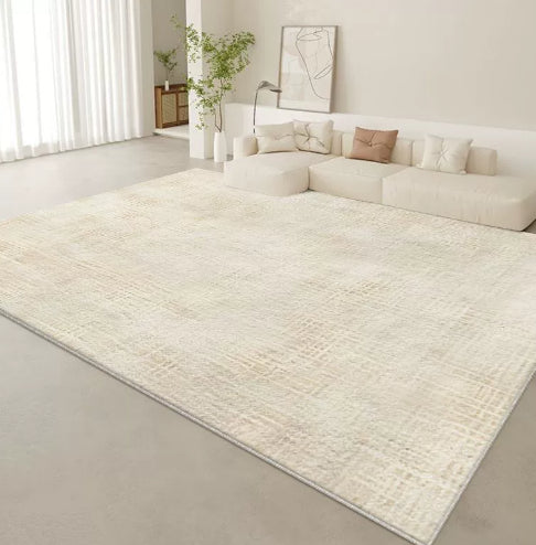 Tappeto beige con bordo bianco
