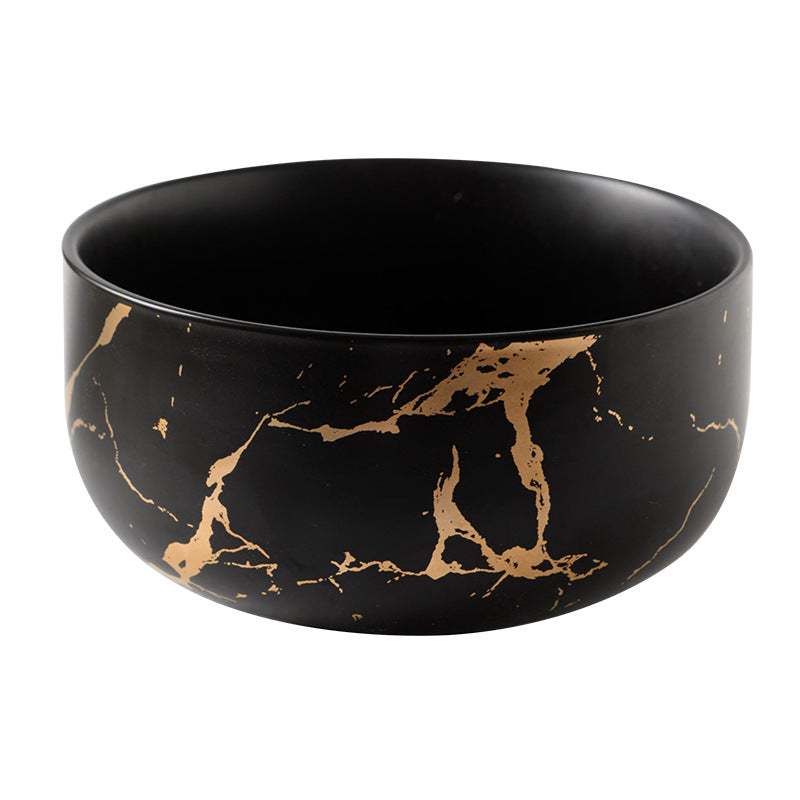 Piatto in ceramica marmo e oro
