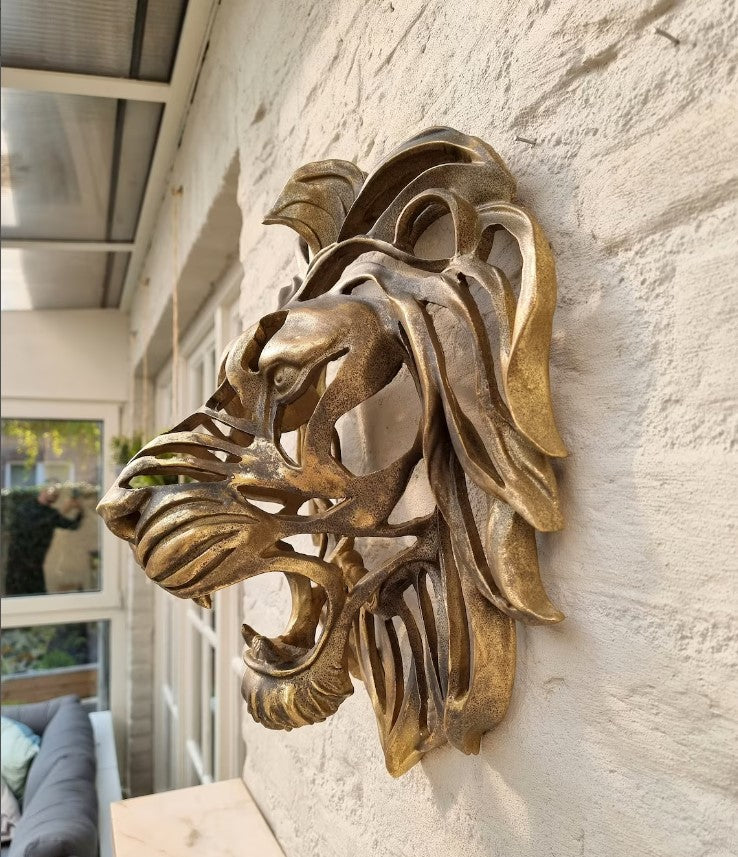 Scultura testa leone