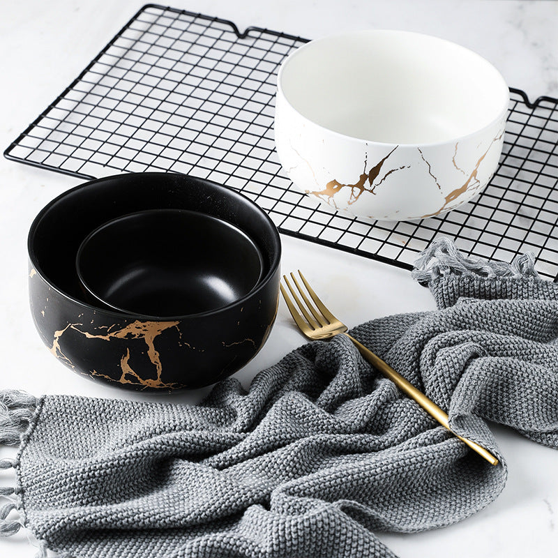 Piatto in ceramica marmo e oro