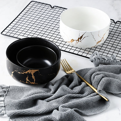 Piatto in ceramica marmo e oro