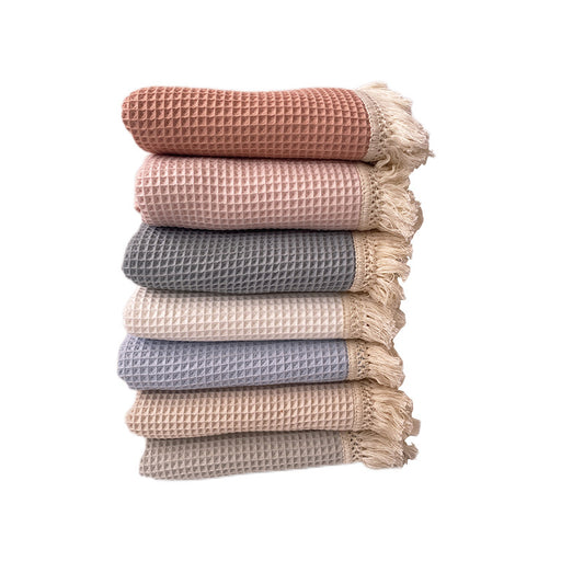 Coperta con nappine