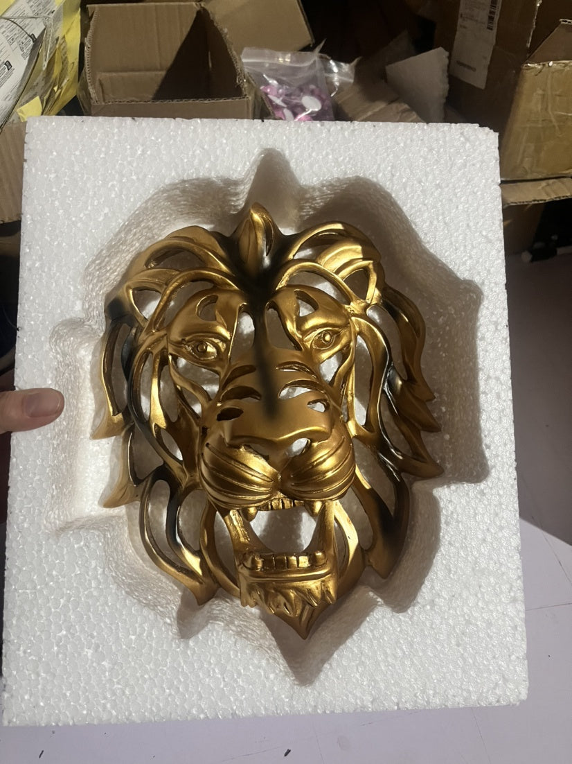 Scultura testa leone