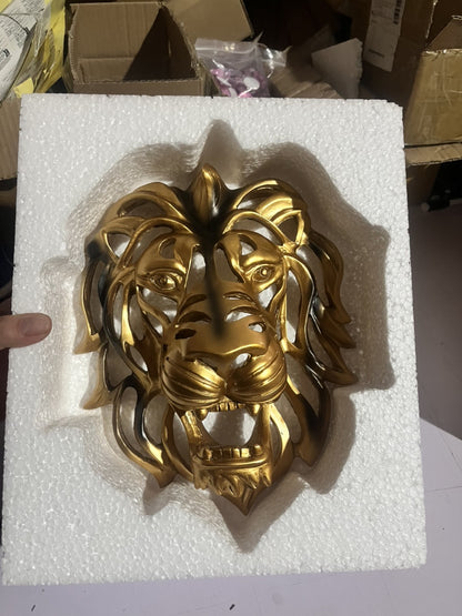 Scultura testa leone