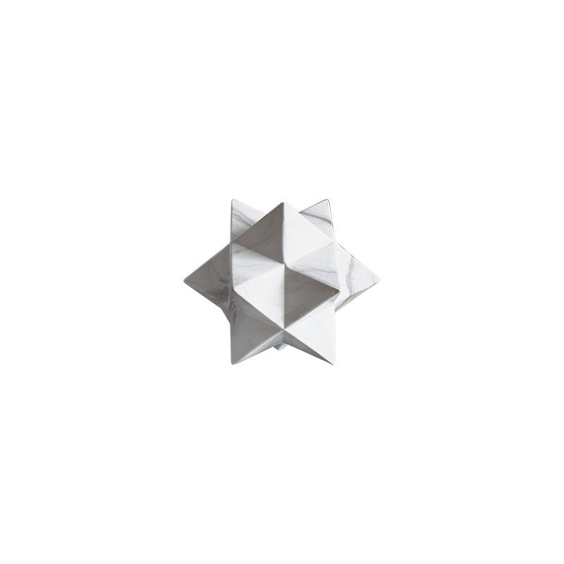 Stella geometrica in marmo