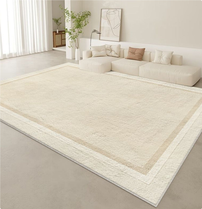 Tappeto beige con bordo bianco