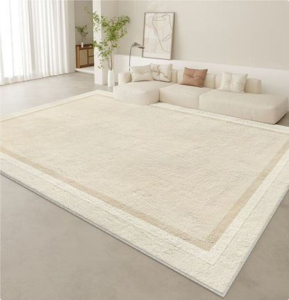 Tappeto beige con bordo bianco