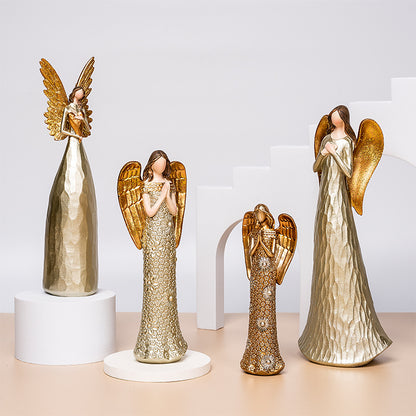 Quattro angeli snelli decorati oro
