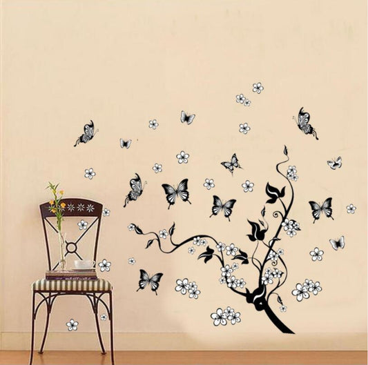 Adesivo murale Farfalle e fiori decorativi