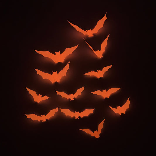 Adesivo murale Solo pipistrelli luminescenti arancioni