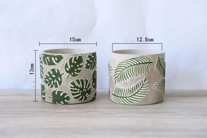 Vaso cemento foglie monstera