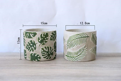 Vaso cemento foglie monstera