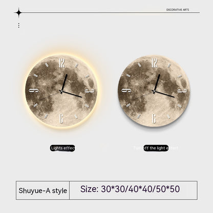 Orologio da parete Luna con halo luminoso