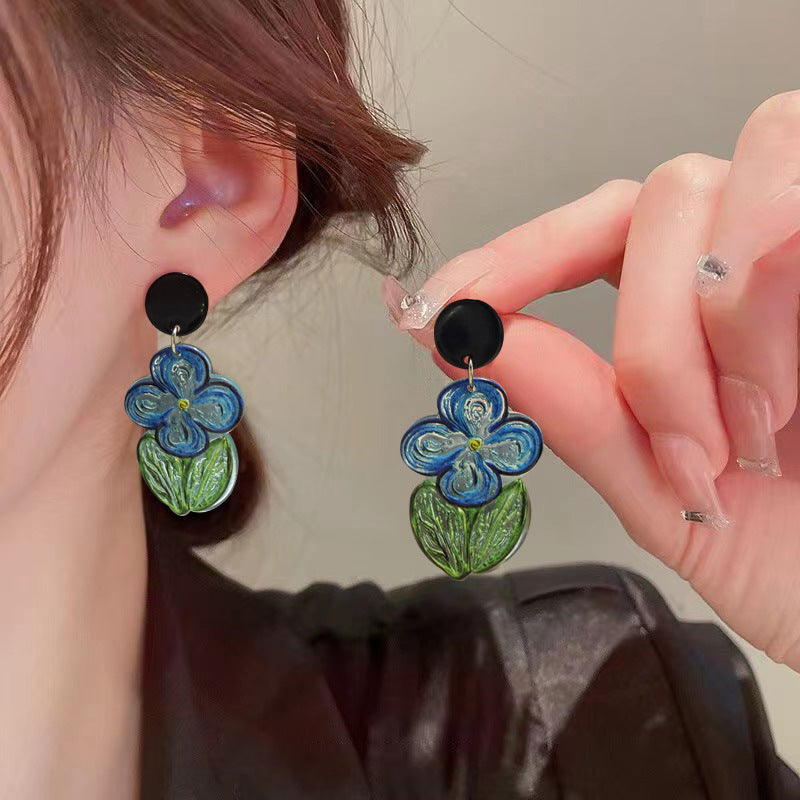 Orecchini fiore blu