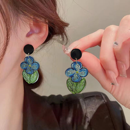 Orecchini fiore blu