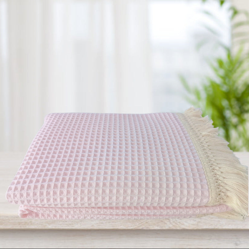 Coperta con nappine