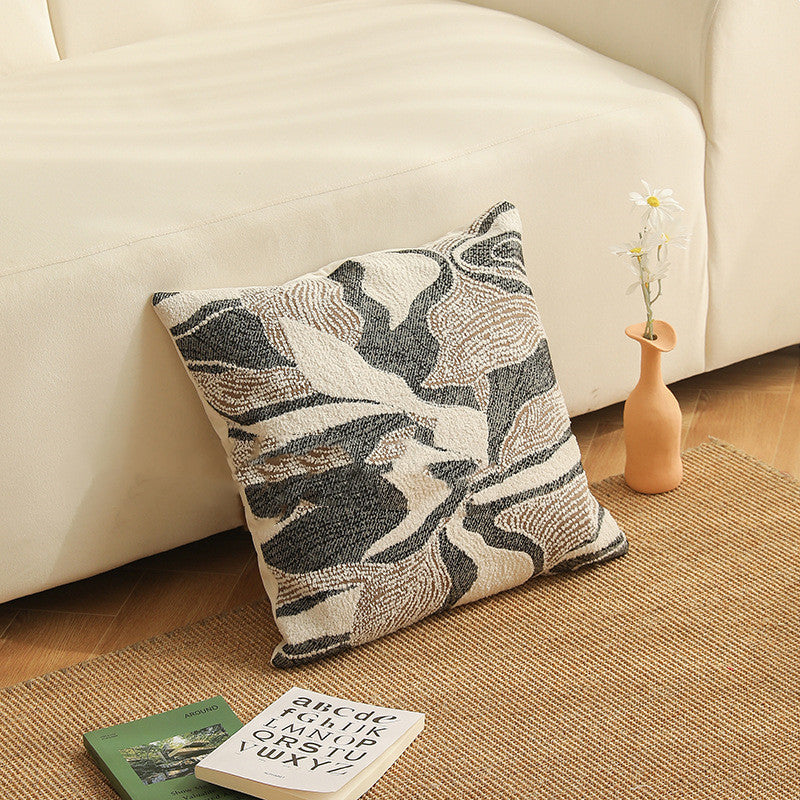 Copricuscino beige con motivo floreale