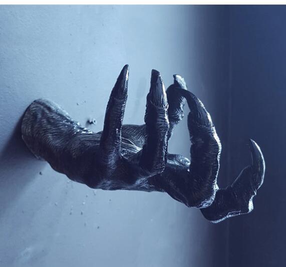 Ornamento mano strega