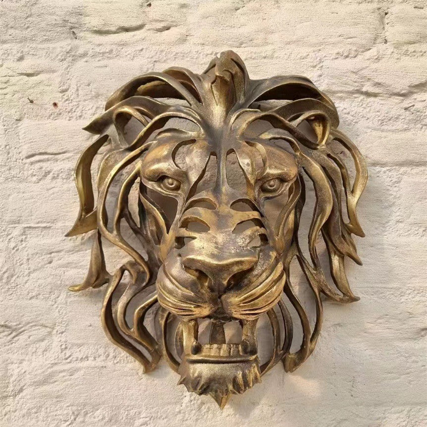 Scultura testa leone