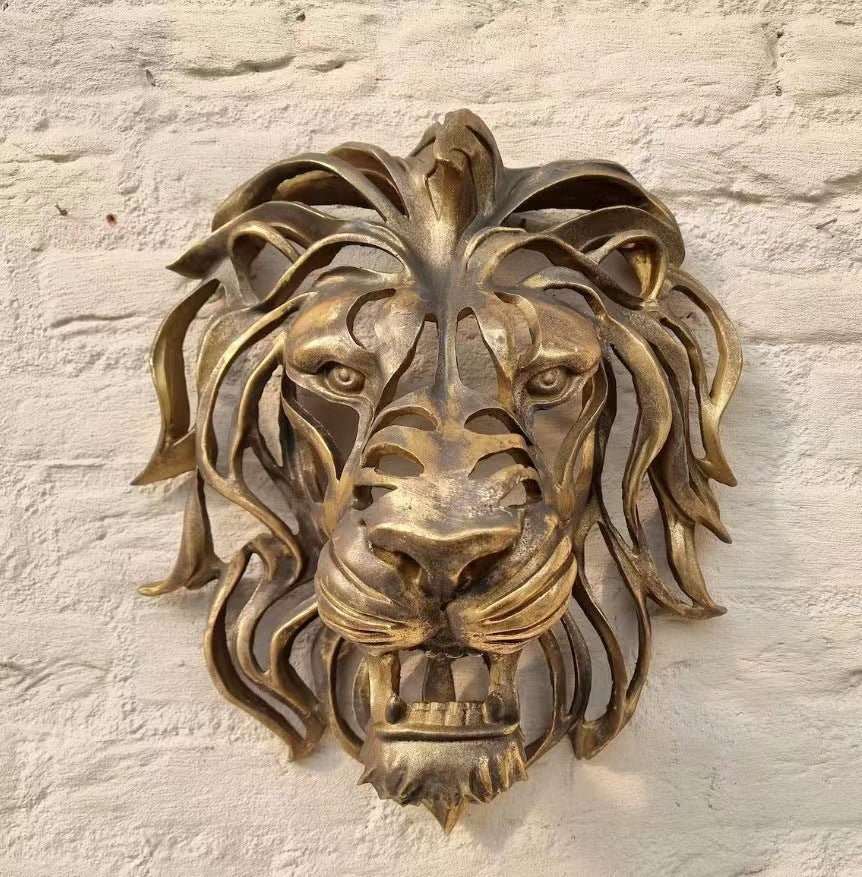 Scultura testa leone