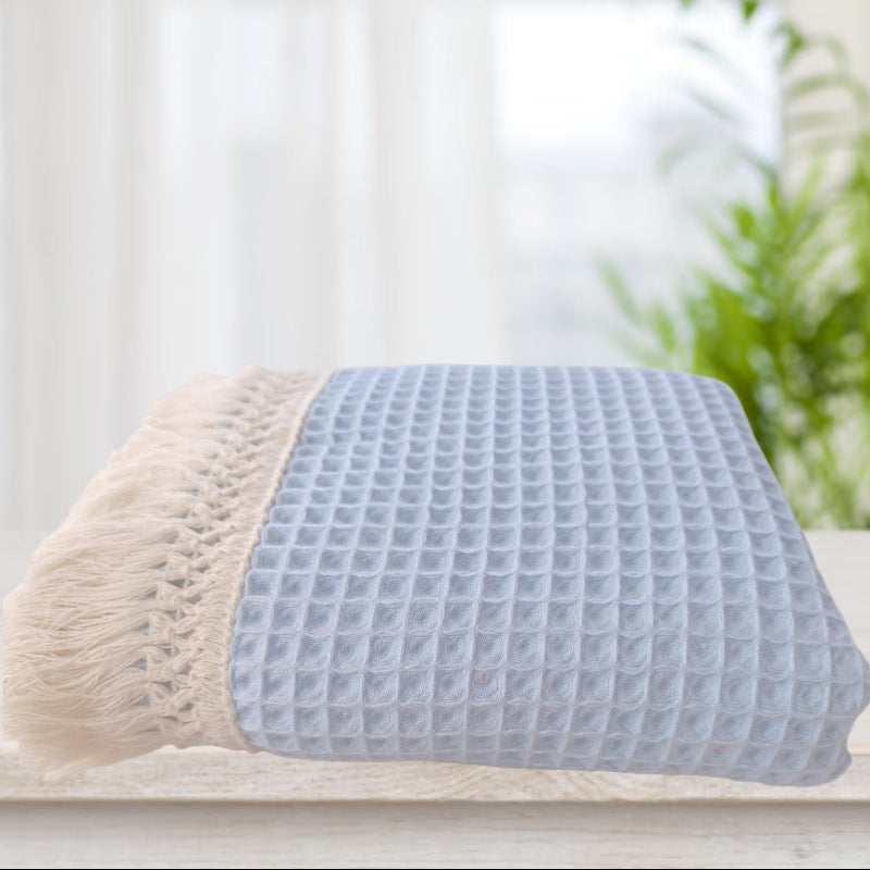 Coperta con nappine