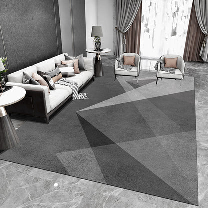 Tappeto geometrico grigio e nero con
