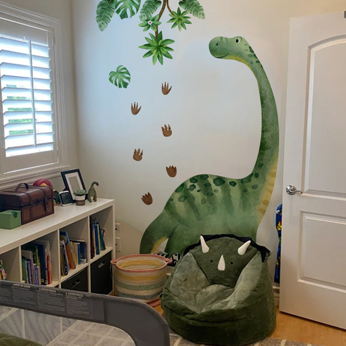 Adesivo murale dinosauri e foglie