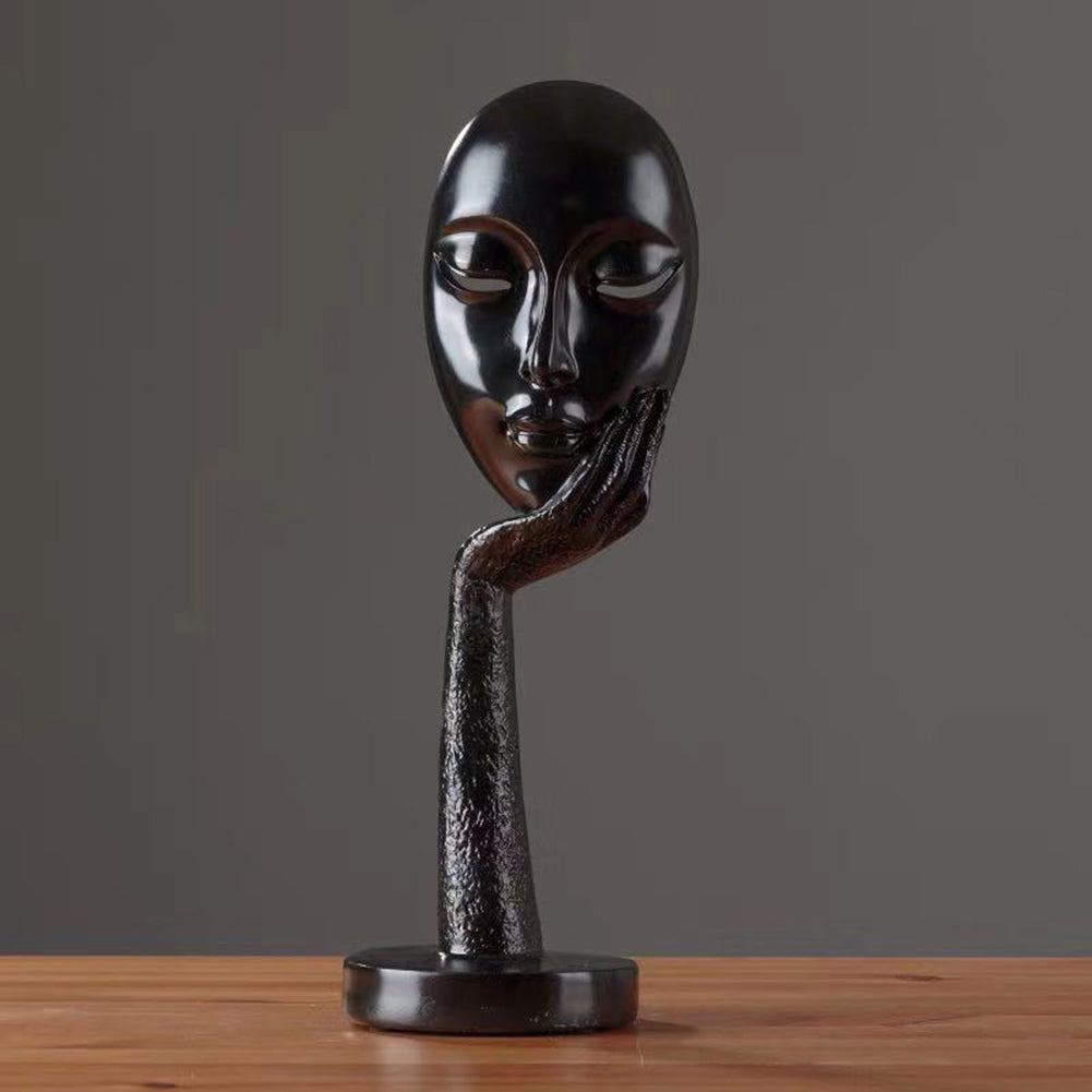 Statuetta donna pensierosa