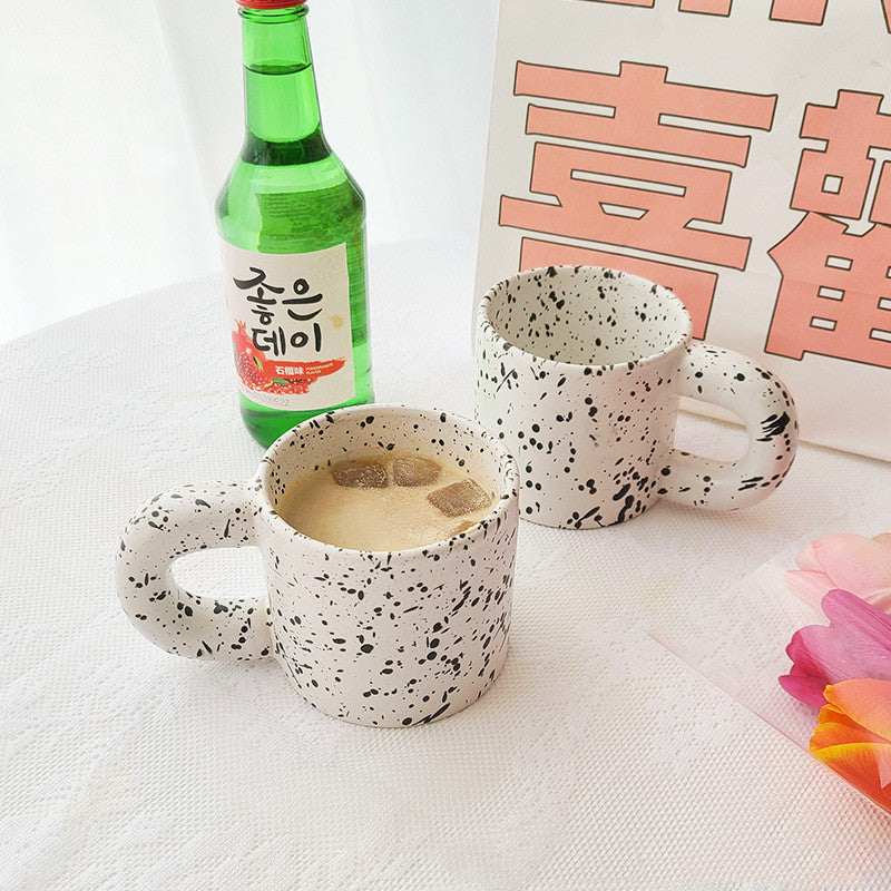 Tazza con inchiostro sparso
