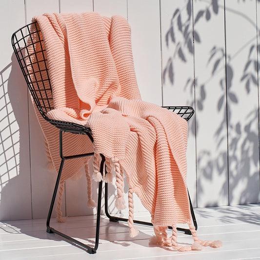 Coperta maglia con nappe