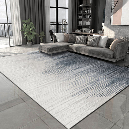 Tappeto geometrico grigio e nero con