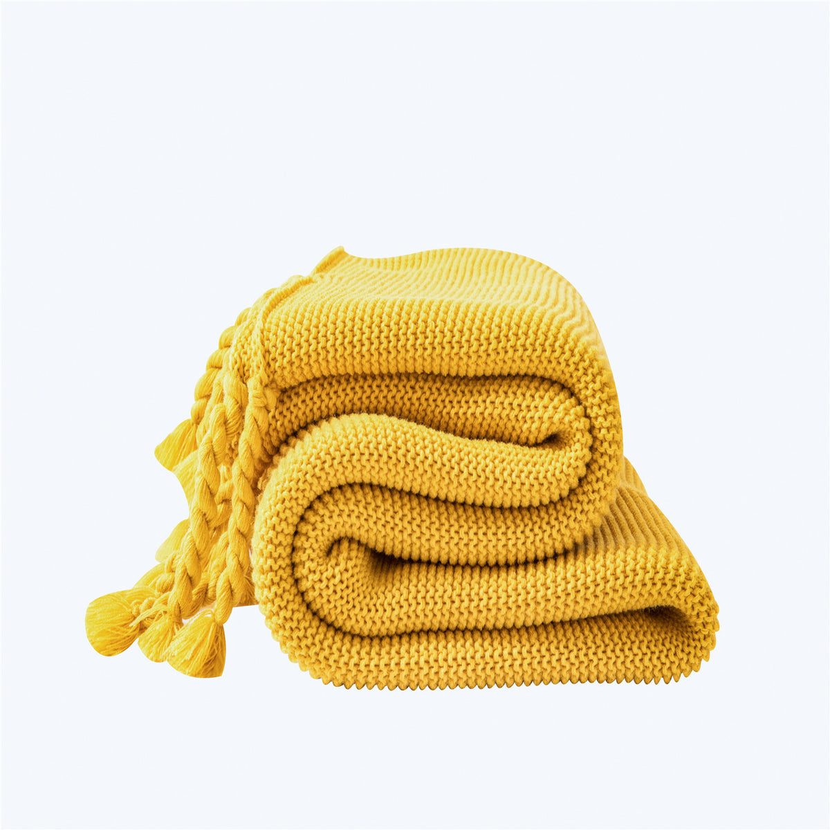 Coperta maglia con nappe