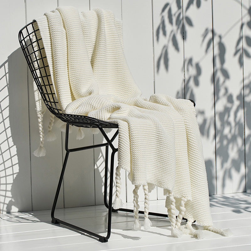 Coperta maglia con nappe