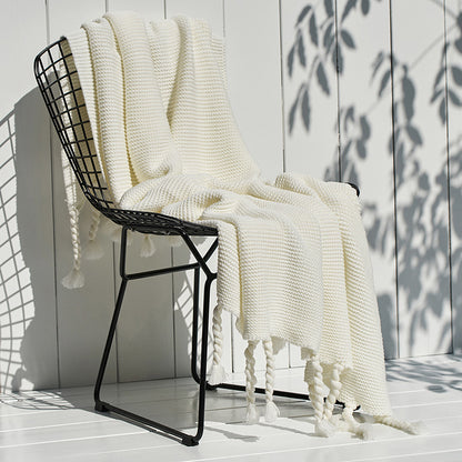 Coperta maglia con nappe