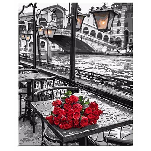 Quadro su tela Rose rosse in piazza parigina