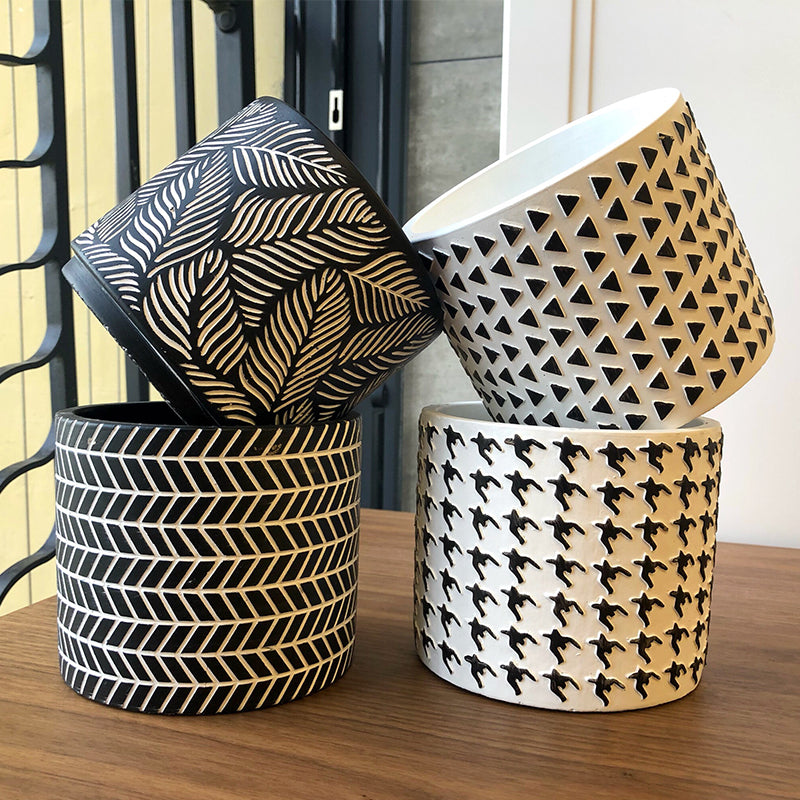Vaso cemento scolpito