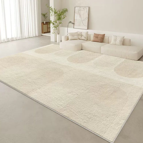 Tappeto beige con bordo bianco