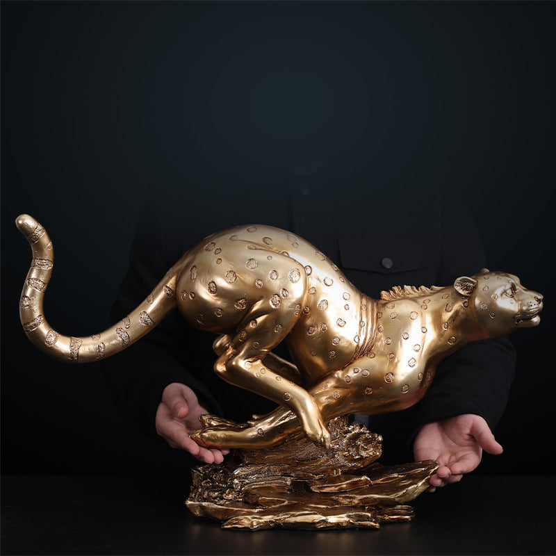 Statuetta pantera resina dorata