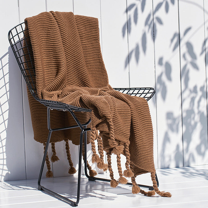 Coperta maglia con nappe